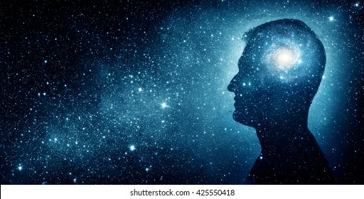 The universe within. Silhouette of a man inside the universe. The concept on scientific and philosophical topics.