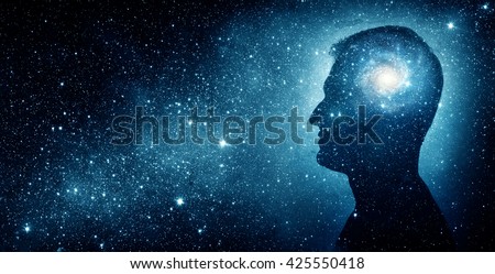 The universe within. Silhouette of a man inside the universe. The concept on scientific and philosophical topics.