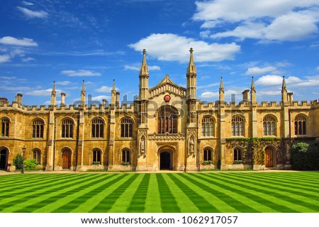 university in Cambridge with a beautiful lawn under a blue sky on a sunny day   in summer                      