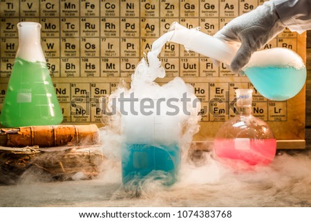 University chemical lab during experiment with periodic table of elements