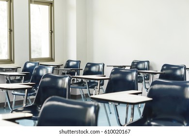 University lecture chairs and tables in classroom