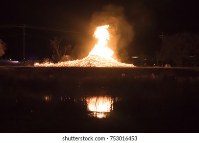 University Of North Texas Bonfire For Homecoming Week With Reflection And Silhouette 