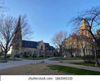 The University Of Notre Dame Golden Dome And Basilica.