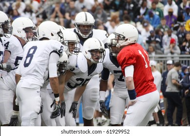 UNIVERSITY PARK, PA - APRIL 24: Penn State Quarterback #11 Matt  McGloin Gives The Play To The Huddle During A Game At Beaver Stadium April 24, 2010 In University Park, PA