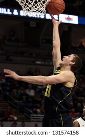 UNIVERSITY PARK, PA - FEBRUARY 27: Michigan Guard Nik Stauskas Goes Up For A Shot Against Penn State  At The Byrce Jordan Center February 27, 2013 In University Park, PA