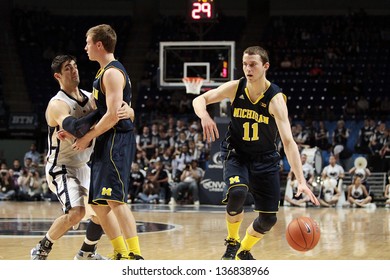 UNIVERSITY PARK, PA - FEBRUARY 27: Michigan's #11 Nik Stauskas Dribbles The Basketball Against Penn State At The Byrce Jordan Center February 27, 2013 In University Park, PA