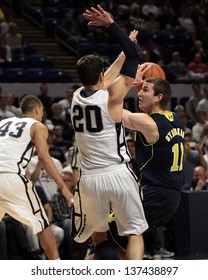 UNIVERSITY PARK, PA - FEBRUARY 27: Michigan's #11 Nik Stauskas Dribbles The Basketball Against Penn State At The Byrce Jordan Center February 27, 2013 In University Park, PA