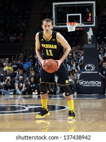 UNIVERSITY PARK, PA - FEBRUARY 27: Michigan's #11 Nik Stauskas Dribbles The Basketball Against Penn State At The Byrce Jordan Center February 27, 2013 In University Park, PA