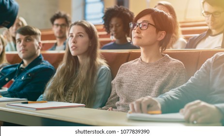 University Professor Holds Lecture to a Classroom Full of Multi Ethnic Students. Prominent Lecturer Teaching Bright Young People.