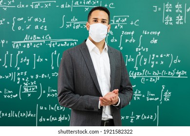 University Professor Standing In Class Wearing Face Mask