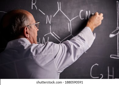 University Professor Writing Chemistry Formulas On Blackboard, Professional Teacher Hold Lesson For Students