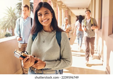 University student, indian woman and portrait at campus outdoor with books of learning, education or knowledge, scholarship and motivation. Happy, smile and young college student, studying or academy - Shutterstock ID 2239596749