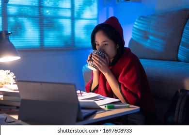 University Student Studying Online At Home, She Is Drinking Coffee