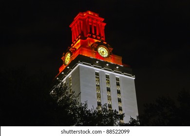 University Of Texas At Austin Tower Glowing In White/orange To Celebrate Athletic Victory Of That Day.