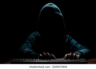 Unknown faceless person sends message with intimidating and threatening to the interlocutor