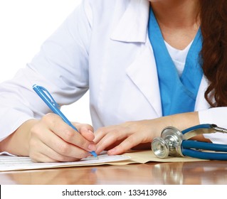 Unknown Female Doctor At Desk Isolated On White Background