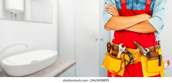 unknown handyman with hands on waist and tool belt with construction tools. tools and manual work concept - Powered by Shutterstock