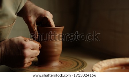 Similar – Image, Stock Photo hands working with clay in a pottery |clay transfer