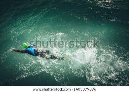 Unknown Swimmer at sea while morning exercise