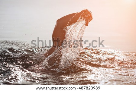 Unknown triathlon swimmer at sea
