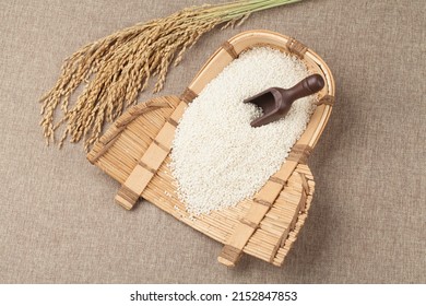 Unlike regular rice, glutinous rice is sticky and tastes good. - Shutterstock ID 2152847853
