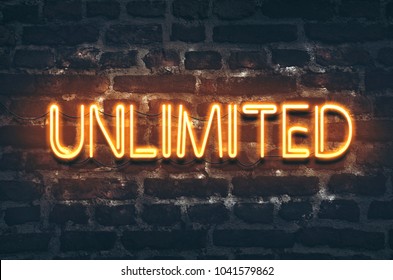 Unlimited Neon Sign On Dark Brick Wall Background