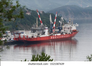 Unloaded Russian Cargo Container Ship Sevmorput - Nuclear-powered Ice Breaker Lighter Aboard Ship Carrier. Container Terminal Commercial Seaport. Pacific Ocean, Kamchatka, Russia - Aug 27, 2019