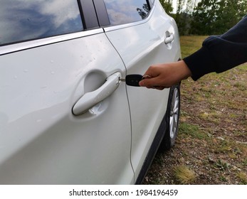 Unlock The Car. Locked Car. White Car.