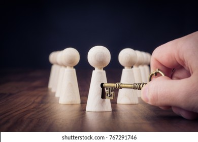 Unlock Potential - Motivational Concept. Manager (HR Specialist) Unlock Leader Potential Represented By Figurine And Hand With Key.