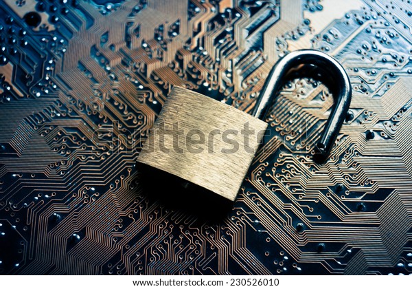 unlock security lock on computer circuit board -\
computer security breach\
concept