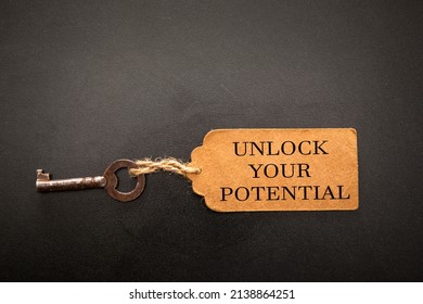 Unlock Your Potential Concept. Vintage Key With Tag
