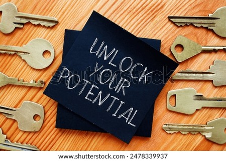 Unlock your potential is shown using a text and photo of keys