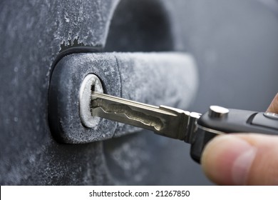 Unlocking A Car Door On A Cold Frozen Winter Morning