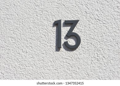 Unlucky House Number 13 Of Black Painted Steel At A Modern Residential Building