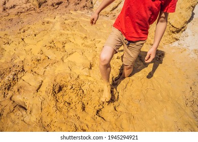 Unlucky Person Standing In Natural Quicksand River, Clay Sediments, Sinking, Drowning Quick Sand, Stuck In The Soil, Trapped And Stuck Concept