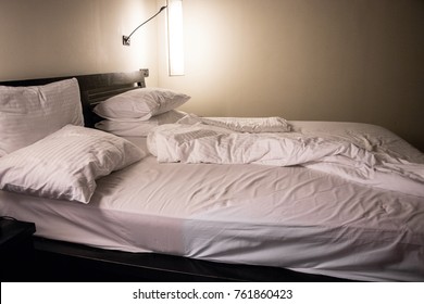 Unmade White Bed