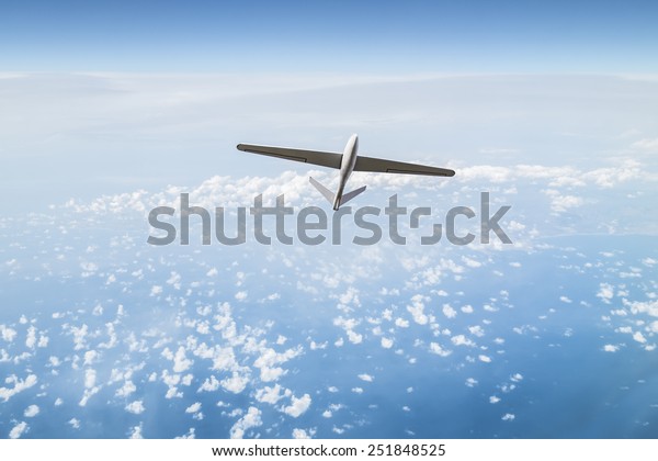 Unmanned aerial vehicle\
in the cloudy sky