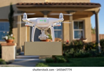 Unmanned Aircraft System (UAV) Quadcopter Drone Delivering Package To House.