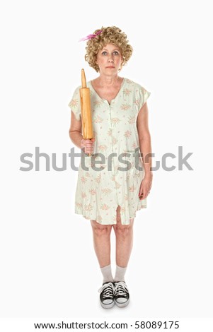 Unmoving housewife with rolling pin on white background