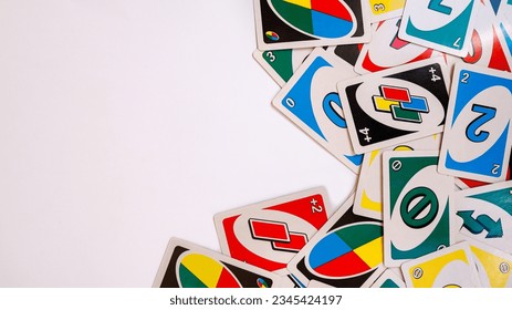 Uno cards on white texture for background and text.