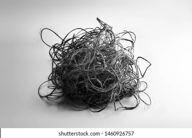 Unorganized Mess. Tangled, Stress, Confused, Complicated, Concept Image. Large Ball Of Tangled And Hemp String Isolated On Neutral White Background.