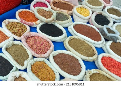 Unpackaged vegetable seeds, organic vegetable seeds, seed seller and ancestor seeds sold in cloth bags at seed shops, - Shutterstock ID 2151095811