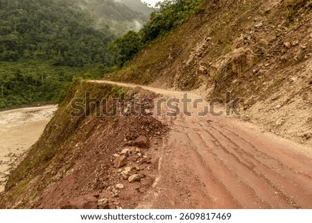 Unpaved 5NA road between Codo de Pozuzo and Pozuzo in Pozuzo river valley, Peru