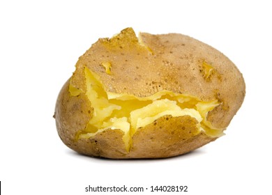 Unpeeled cracked cooked potato on a white background