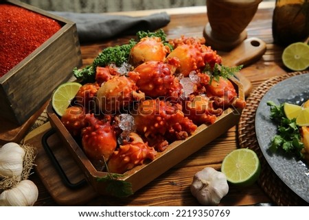 Unpeeled sea squirt on a plate