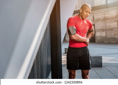 Unpleasant Pain. Nice Unhappy Man Holding His Hip While Feeling Pain There