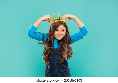 Unpleasant Teen Girl With Curly Hair Wear Crown On Blue Background, Selfishness