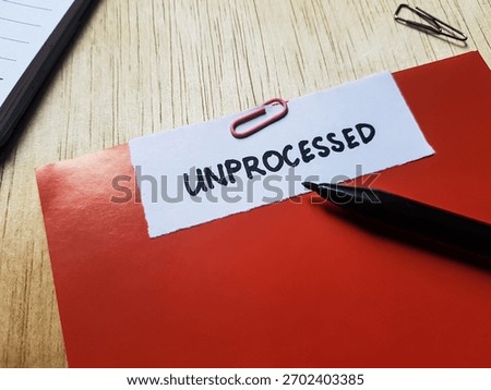 Unprocessed writting on table background.