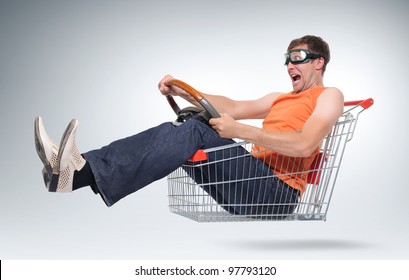 Unreal crazy driver in a shopping-cart with wheel, concept car shopping