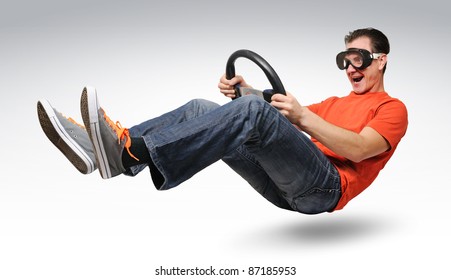 Unreal funny man car driver in goggles with a wheel, auto concept